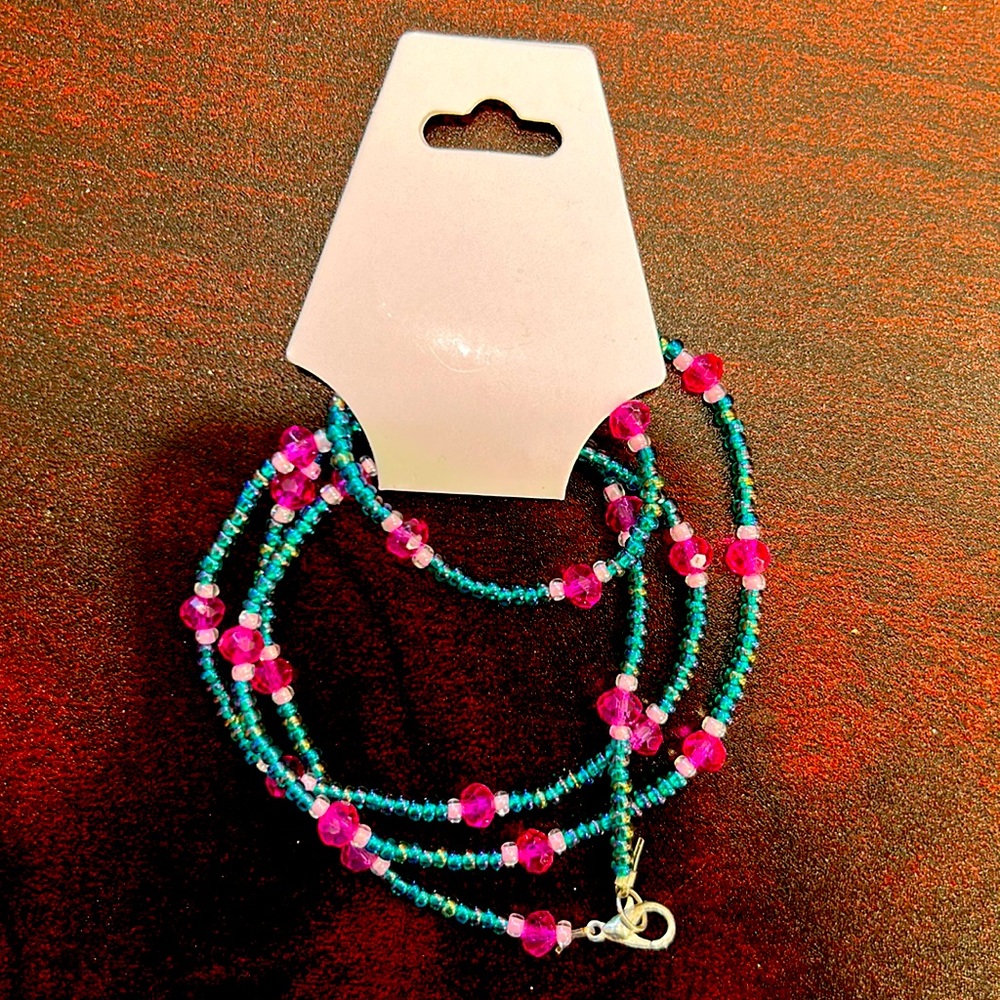 29 1/2in light blue belly chain with tiny light pink with dark pink spacers